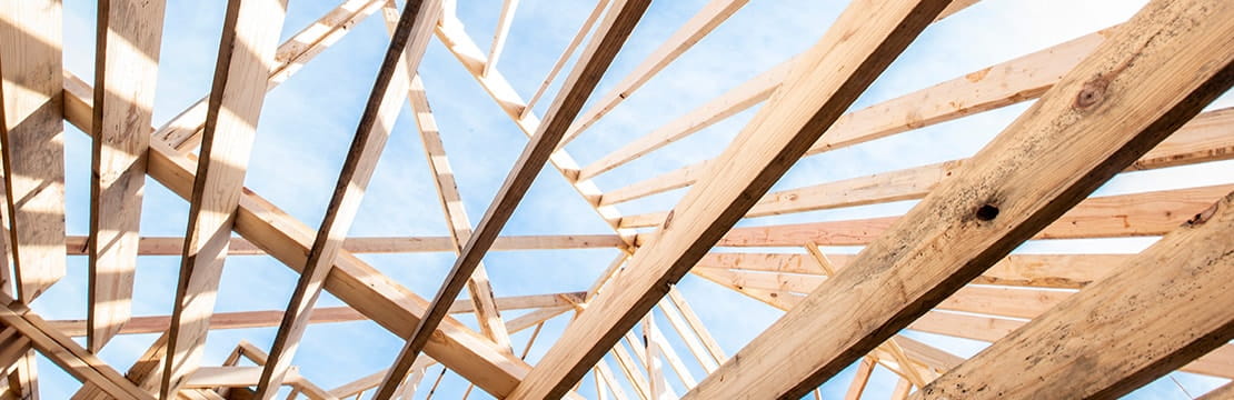 Close up from below of exposed house wooden frame